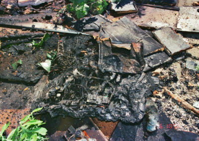 Verschmorte Gegenstände nach einem Brand im Schlafzimmer